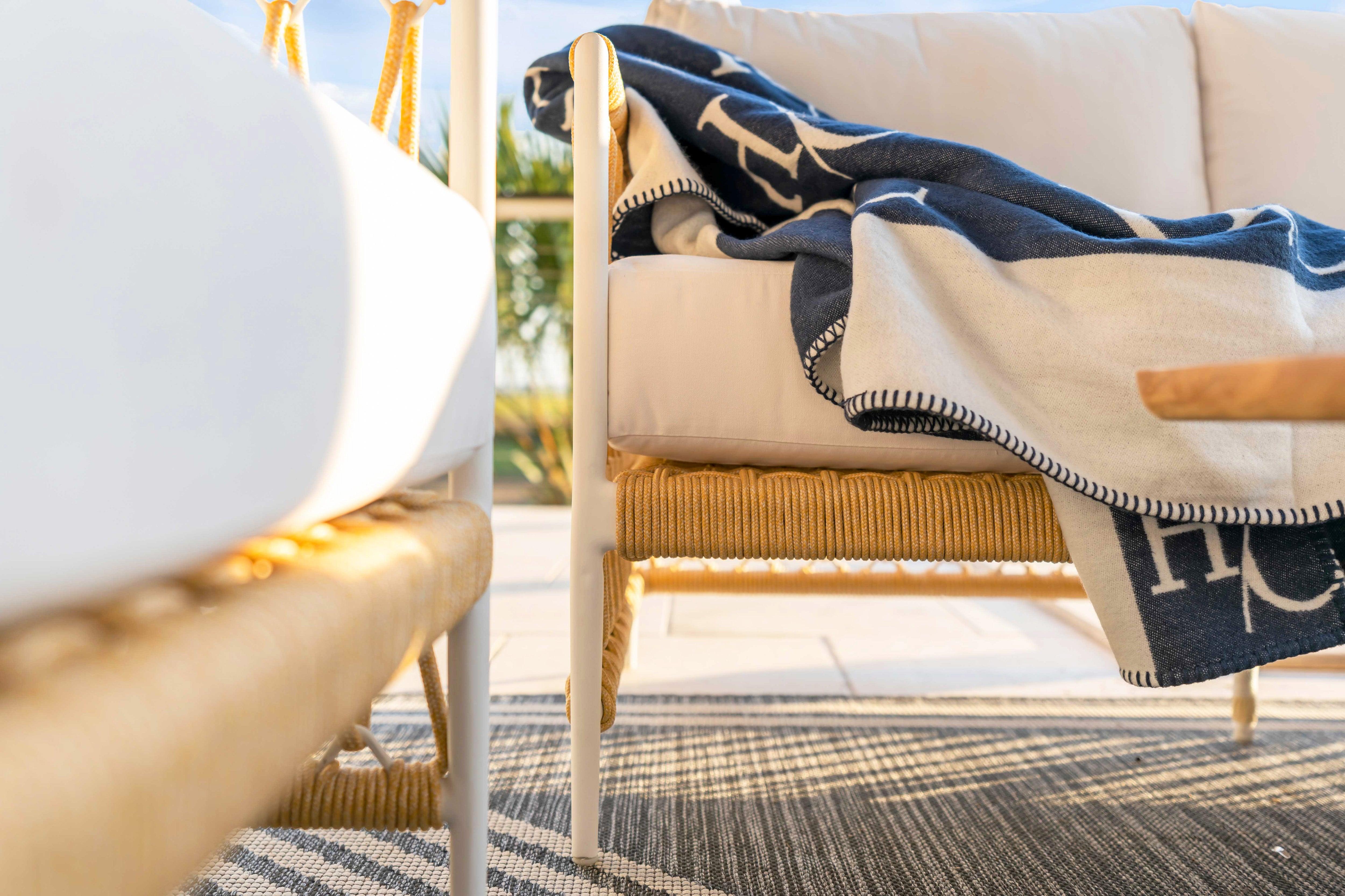 Harbor Classic Timelessly Designed Outdoor White Aluminum And Weatherproof Rope Sofa.