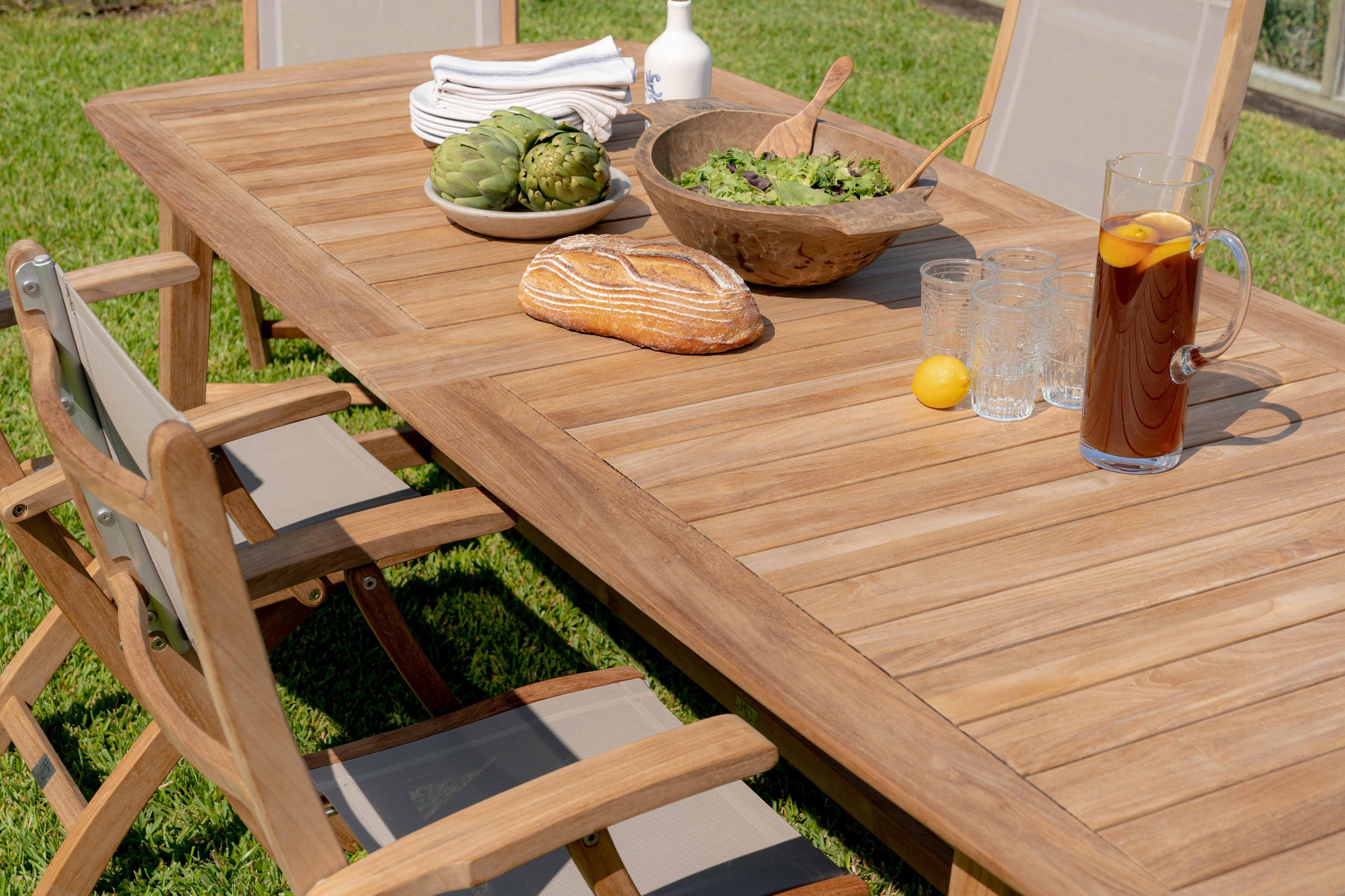 Long teak store outdoor table